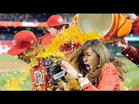 Hot reporter Julie Alexandria gets a surprise Gatorade shower. FUNNY Prank